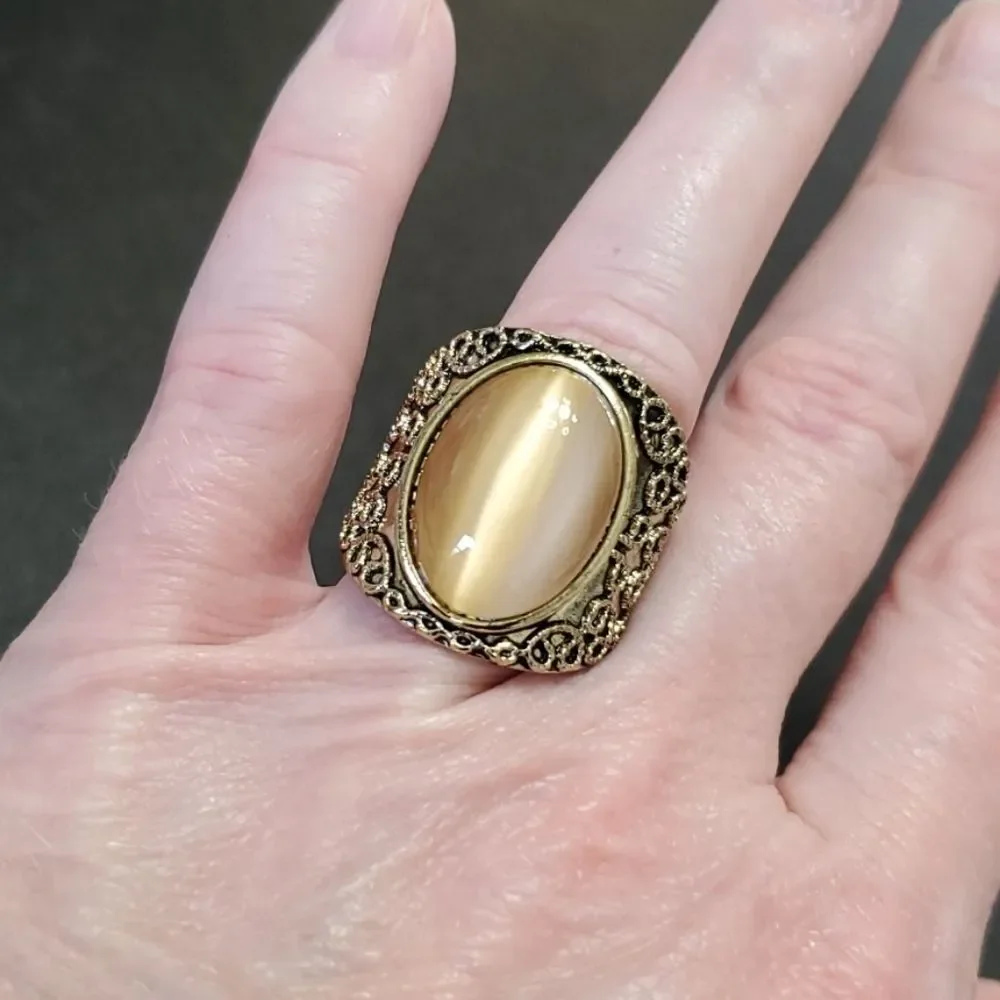 Gold tone ring with stone